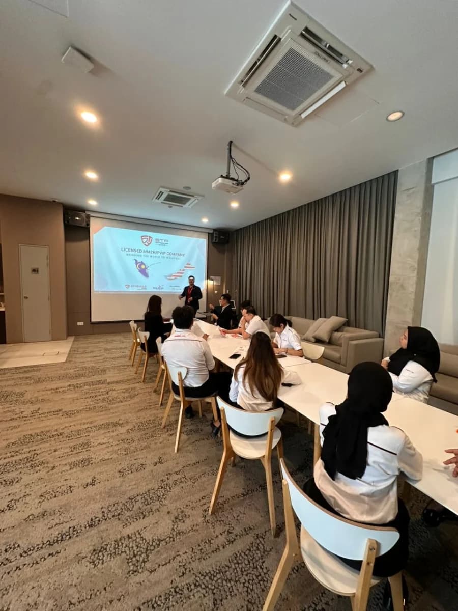 MalaysiaVisaExpert.com team at a visa and residency event, photo 5